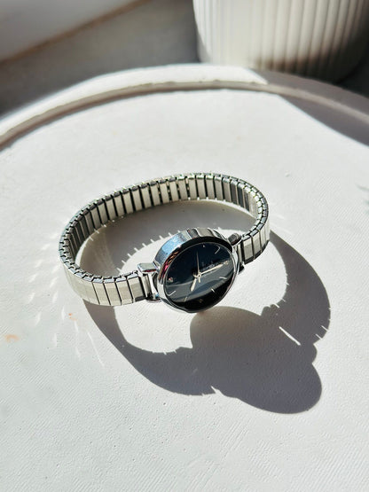 Mira metal yay kordonlu zarif, şık, minimal kadın kol saati