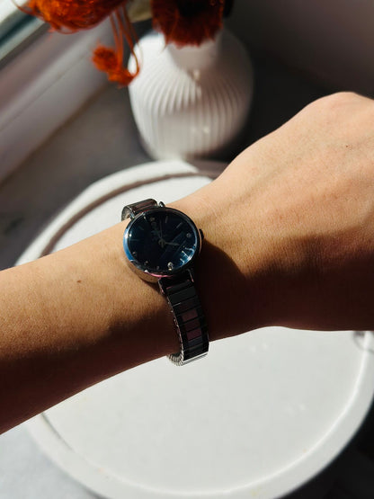 Mira metal yay kordonlu zarif, şık, minimal kadın kol saati